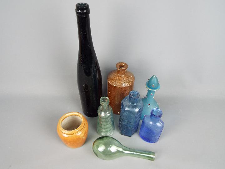 A collection of stoneware and glass bottles and pots, early to mid 20 th century, - Image 3 of 4