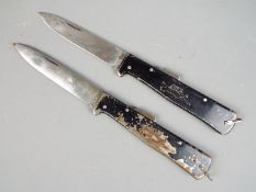 Two vintage German Mercator K55K folding knives.