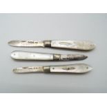 Three silver and mother of pearl folding fruit knives, one Victorian example,
