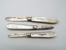 Three silver and mother of pearl folding fruit knives, one Victorian example,