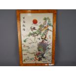 Chinese Art - A 20th century embroidered depicting the sun rising over pine and prunus trees with