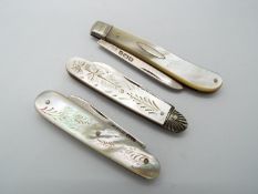 Three George V silver and mother of pearl folding fruit knives,