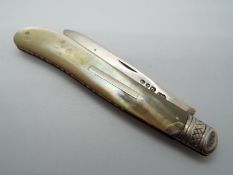 A Victorian silver and mother of pearl folding fruit knife,