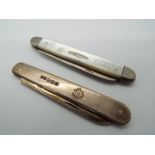Two folding knives, the first a Victorian silver and mother of pearl example,