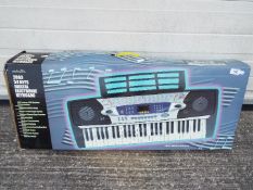A boxed Prolectrix Digital Electronic Keyboard.