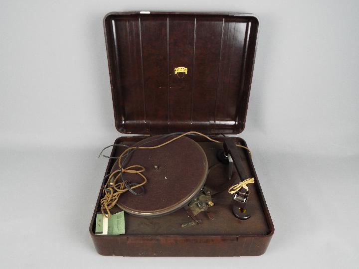 A vintage, bakelite cased Columbia electric record player.