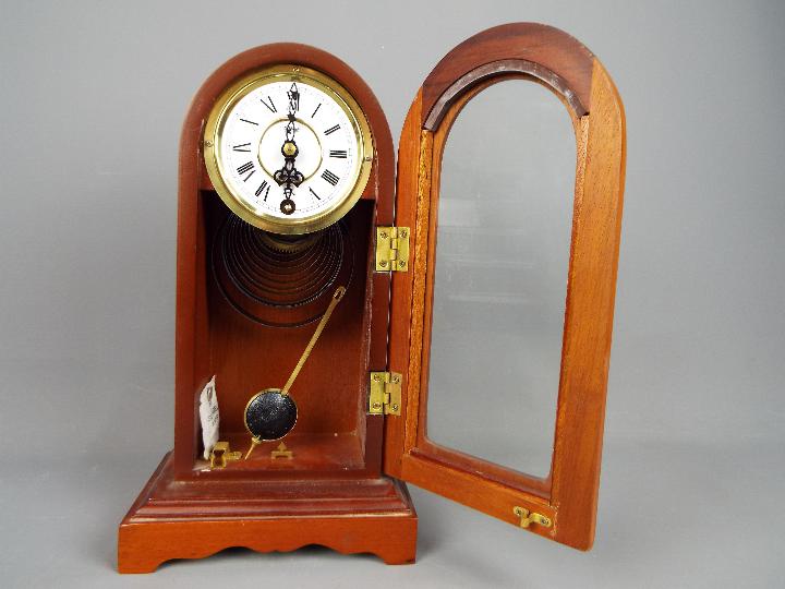Three clocks to include a Brevete travel alarm clock, a Metamec mantel clock and similar. - Image 2 of 10