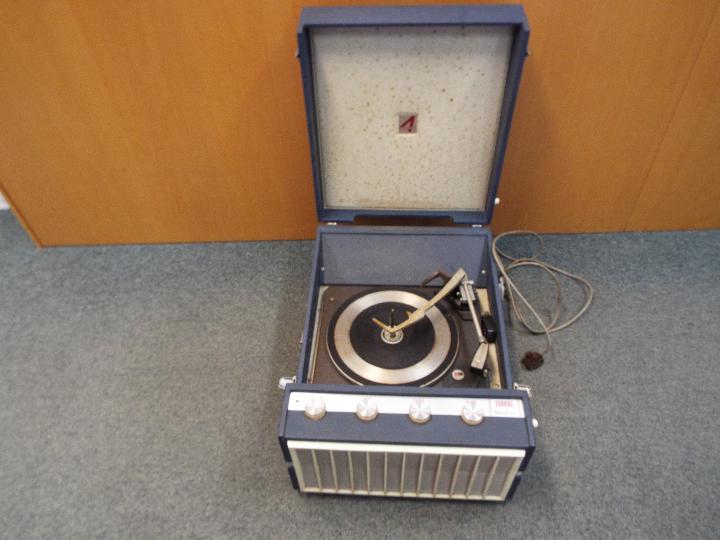 Garrard - a Garrard turntable in a Decca portable record player