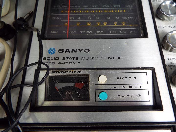 A vintage Sanyo Solid State Music Centre in briefcase, model G-2615N-2. - Image 4 of 5