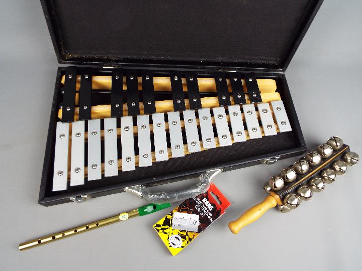 A cased tenor alto glockenspiel, tin whistle, sleigh bells and similar. - Image 2 of 3