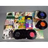 A collection of over 140 predominantly 1960's 7" vinyl records,
