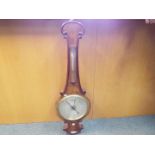 A good quality mercury wheel barometer with carved case,