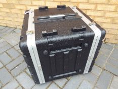 A Thomann Rack Case 12U, hard flight case.