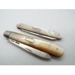 Two George V silver and mother of pearl folding fruit knives,