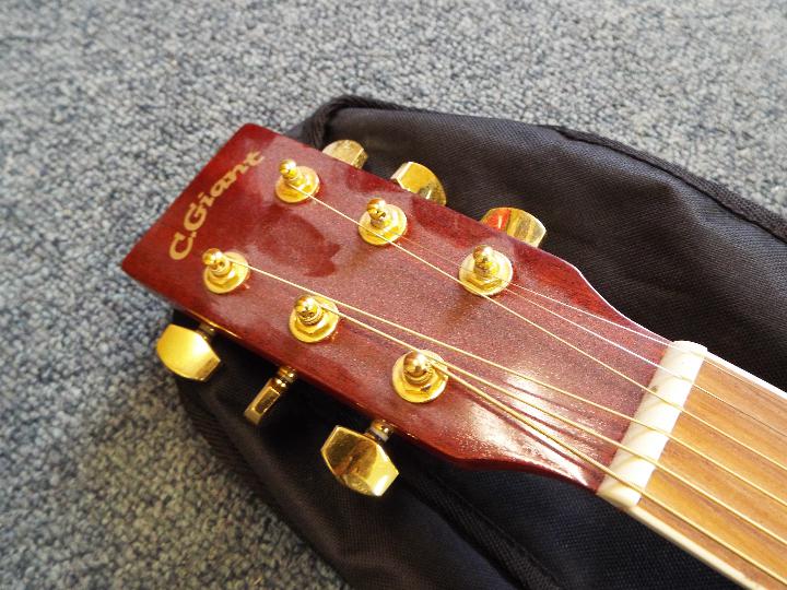 A C. Giant acoustic guitar with soft case and Seiko digital tuner. - Image 4 of 6