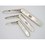 Three George V silver and mother of pearl folding fruit knives, all Sheffield assay,