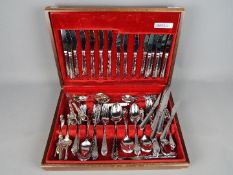 A canteen of cutlery with contents.