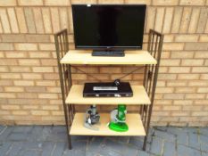 A metal framed freestanding bookcase approximately 111 cm x 75 cm x 31 cm,