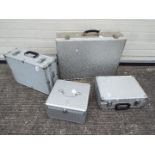 Four aluminium flight cases of varying s