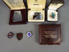 A small lot of collectables to include two cased Ronson cigarette lighters comprising a Varaflame