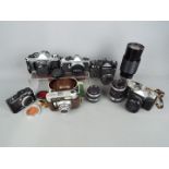 Photography - A collection of cameras and accessories to include Zeiss Ikon, Zenit, Canon,