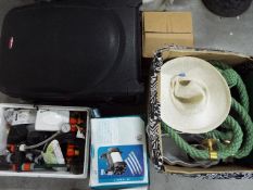 A mixed lot to include ceramics, gardening accessories, boxed speaker, travel luggage and similar.