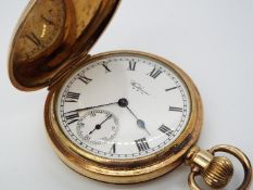 A Waltham Traveler, gold plated, full hunter, crown wind pocket watch.