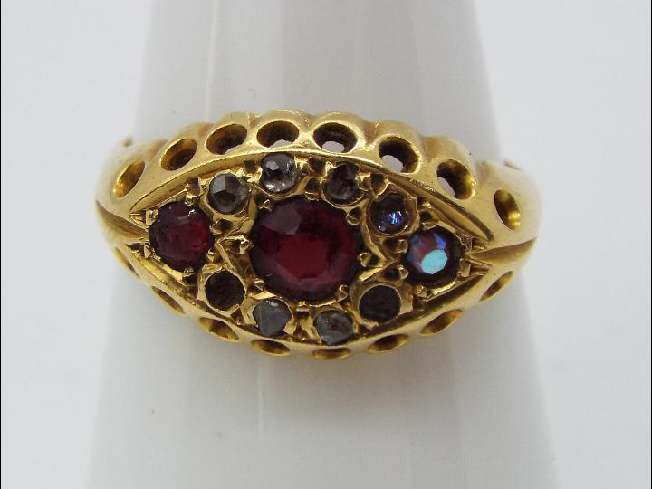 A hallmarked 18ct yellow gold, stone set dress ring, size N, approximately 3.9 grams all in. - Image 2 of 2