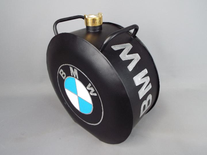 A black petrol can marked B.M. - Image 2 of 3