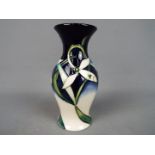 Moorcroft - a Moorcroft vase decorated in the Twenty Winters pattern,
