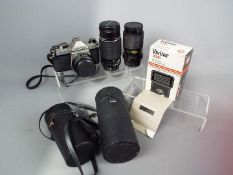 Photography - A Pentax K1000 camera with fitted Vivitar 28mm f/2.