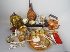 A collection of metalware to include plated ware, copper, horse brasses, brass ornaments,