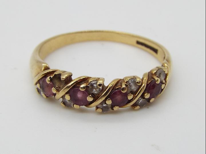 9ct Gold - a 9ct yellow gold stone set ring, size O½, approx weight 2.07 grams all in.