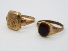 A gentleman's hallmarked stone set 9ct gold ring, size L and a gentleman's signet ring, stamped .