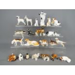 A collection of animal figurines to include Beswick, Royal Doulton, Sitzendorf and similar.