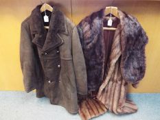 A ¾ length fur coat and stole and a Morlands lambskin coat in dark brown.