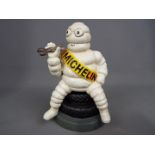 A novelty cast Michelin man,