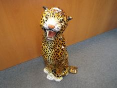 A large pottery figurine depicting a cheetah, probably Italian,