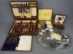 A canteen of cutlery with contents, further cased plated flatware and a quantity of loose items.