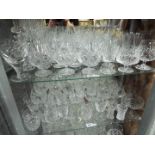 A quantity of good quality glassware to include Stuart Crystal, Brierley and similar, two shelves.