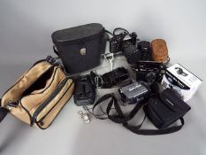 Photography - Lot to include cased binoculars, cameras comprising Canon A1, Fujica Auto-5,