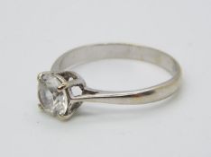 A hallmarked 18ct white gold solitaire ring, size R, approximately 2.99 grams all in.