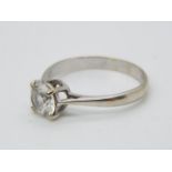 A hallmarked 18ct white gold solitaire ring, size R, approximately 2.99 grams all in.