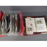 Philately - A suspension file and a binder containing a quantity of stamps,