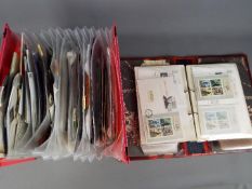 Philately - A suspension file and a binder containing a quantity of stamps,