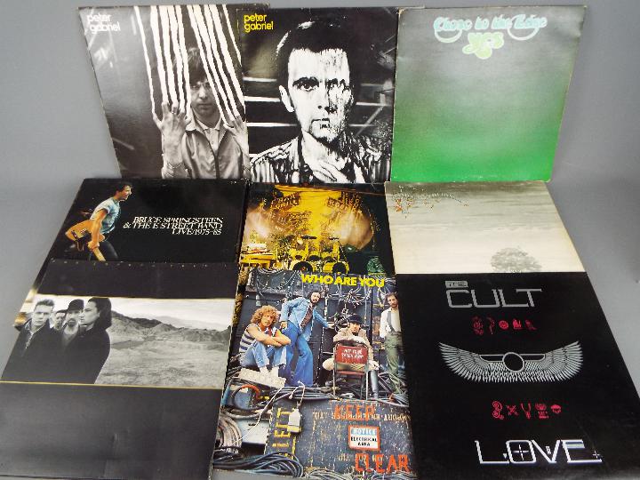 A quantity of 33 RPM vinyl records to include Elvis, The Who, Prince, U2, The Police and similar.