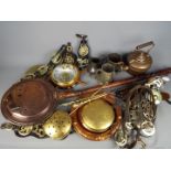 A quantity of metal ware to include pewter, horse brasses, fire irons, and similar.