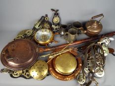 A quantity of metal ware to include pewter, horse brasses, fire irons, and similar.