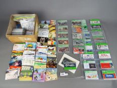 A collection of UK and foreign phone cards.