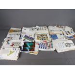 Philately - A large quantity of first day covers, mint stamps and similar, two boxes.